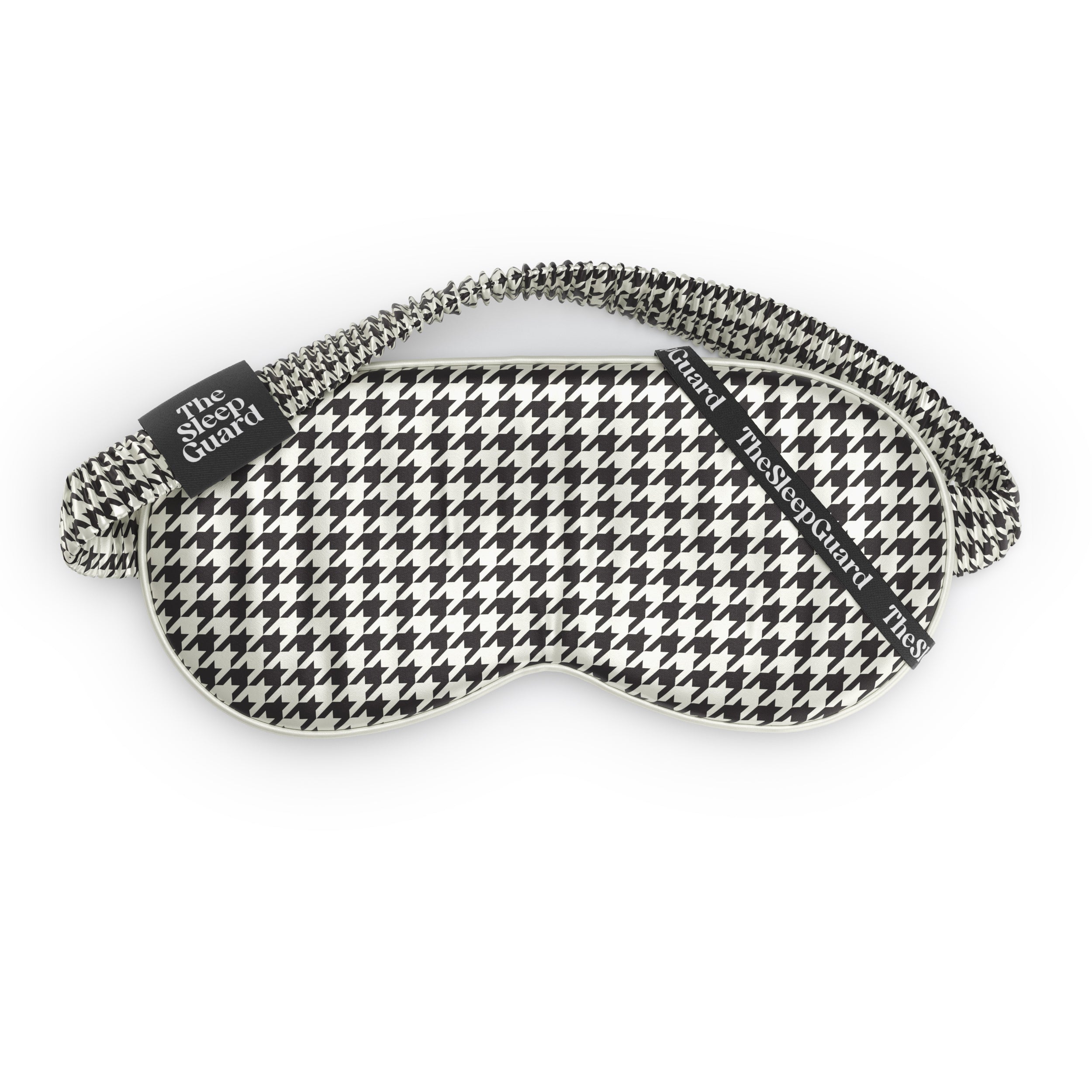Houndstooth patterned sleep mask with a chain on a white background